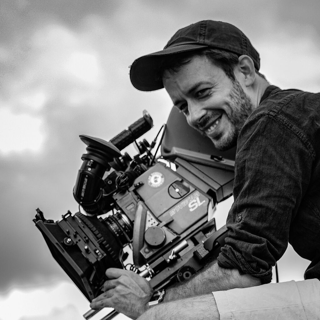 Portrait of Filip Twardowski Director of Photography cinematographer with camera